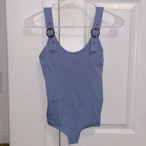dusty blue buckle strap body suit